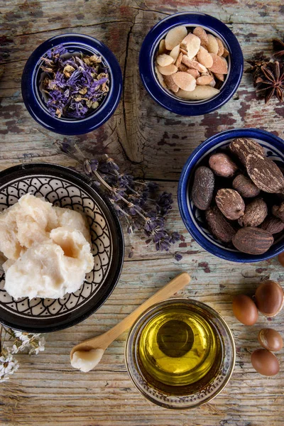 Mix of nuts and herbal, Argan and shea butter — Stock Photo, Image
