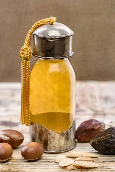 Argan oil and fruits — Stock Photo, Image