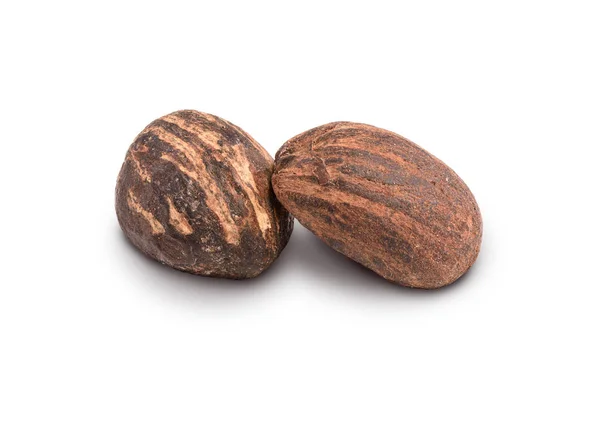 Dos nueces de manteca de karité en blanco —  Fotos de Stock