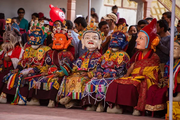 Buddhist monks in colorful costumes — Stock Photo, Image