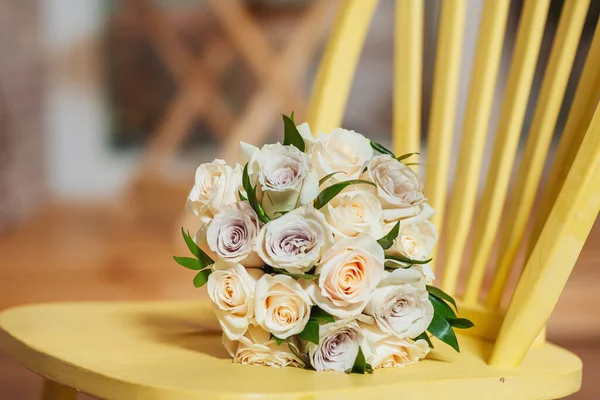 Wedding bouquet of cream roses. Bouquet of white lilac beige roses. Beautiful wedding bouquet