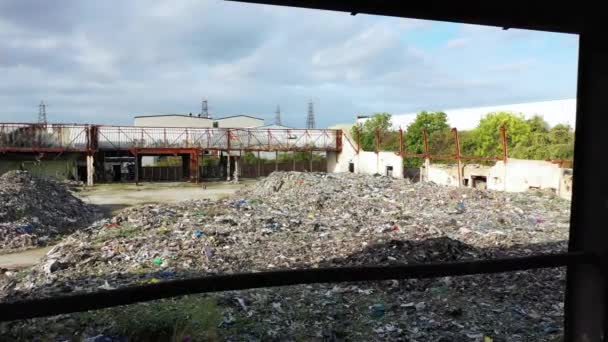 Aerial view of a warehouse destroyed by fire and filled with waste junk, Margate, Kent, UK — ストック動画