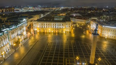 Aerial view to Palace square with Winter Palace and Alexander Column in background, St Petersburg, Russia