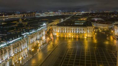 Aerial view to Palace square with Winter Palace and Alexander Column in background, St Petersburg, Russia