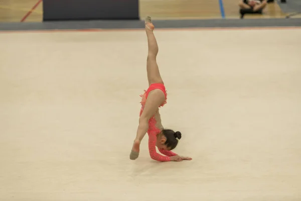 Portrait of a young gymnast. Portrait of a 7 years old girl in rhythmic gymnastics competitions — 스톡 사진