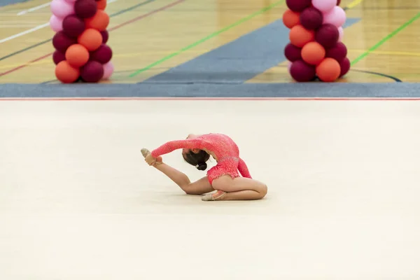 Portrait of a young gymnast. Portrait of a 7 years old girl in rhythmic gymnastics competitions — 스톡 사진