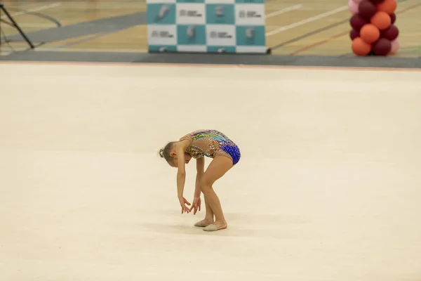 Portrait of a young gymnast. Portrait of a 7 years old girl in rhythmic gymnastics competitions — 스톡 사진