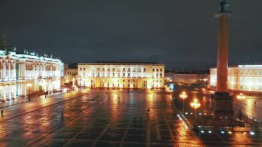 Aerial view to Palace square with Winter Palace and Alexander Column in background, St Petersburg, Russia