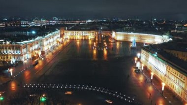 Aerial view to Palace square with Winter Palace and Alexander Column in background, St Petersburg, Russia
