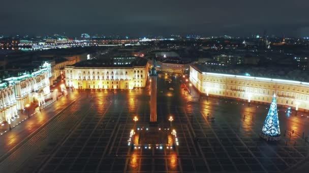 Aerial view to Palace square with Winter Palace and Alexander Column in background, St Petersburg, Russia