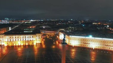 Aerial view to Palace square with Winter Palace and Alexander Column in background, St Petersburg, Russia