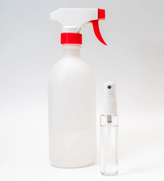 Protective face mask and sanitizer gel dispenser on white background, against Novel coronavirus (2019-nCoV) or Wuhan coronavirus and Influenza. Antiseptic, Hygiene and Healthcare concept