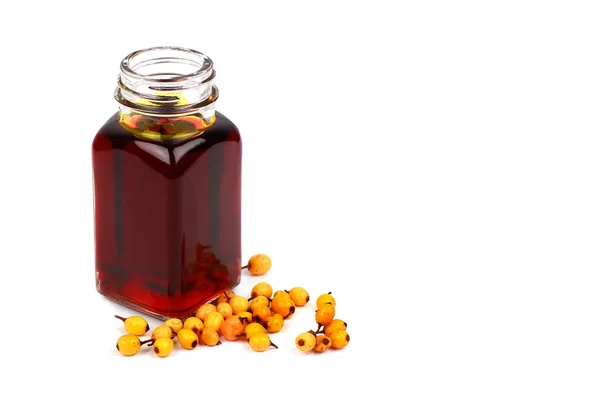 Aceite de espino amarillo en botella de vidrio — Foto de Stock