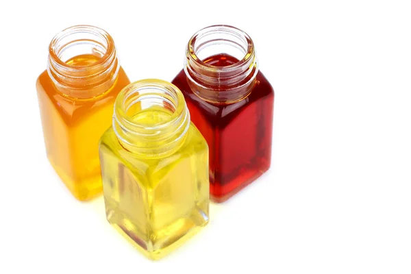 Aceite de ricino, aceite de rosa mosqueta y aceite de mostaza aislado en blanco —  Fotos de Stock