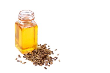 Thistle yağ şişe ve beyaz arka plan üzerinde tohum