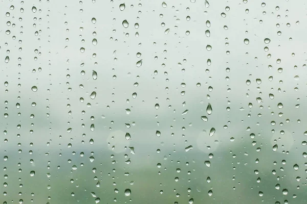 Gotas de chuva de verão na janela — Fotografia de Stock