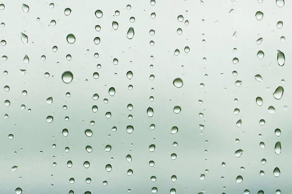 Gotas de chuva de verão no uso da janela como fundo — Fotografia de Stock