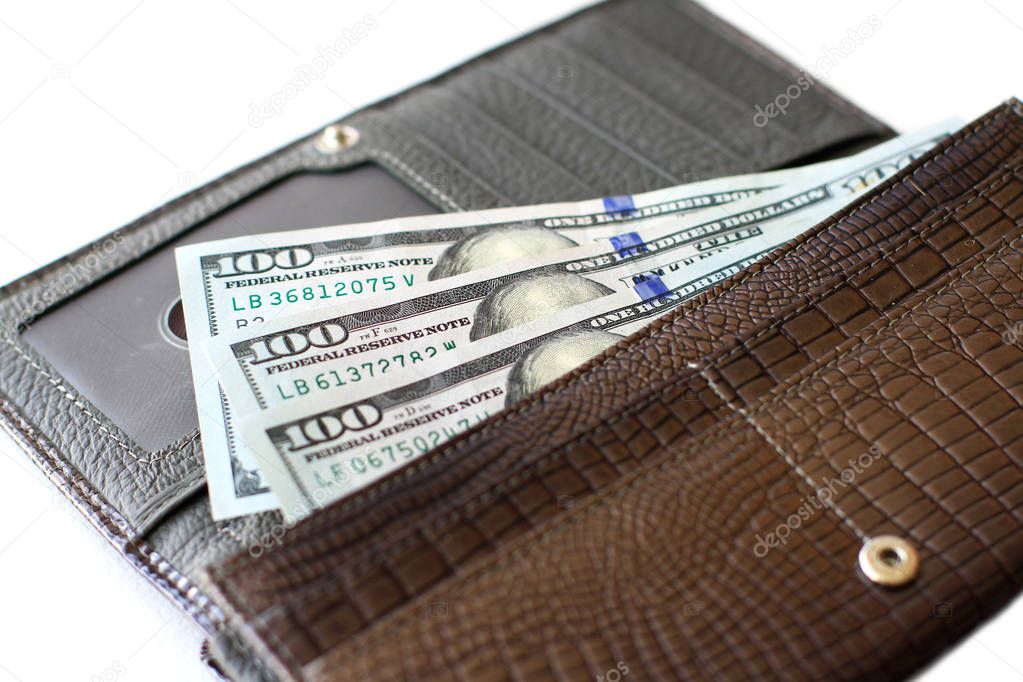 Hundred dollar bills in wallet