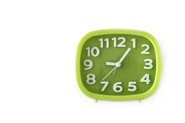 緑の時計と白の数字と白い背景の上の矢印 — ストック写真