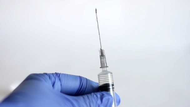 Doctor Hands Blue Medical Glove Holds Medical Syringe Injection Concept — Stock Video