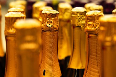 Champagne bottles in the wine store. Selective focus. clipart