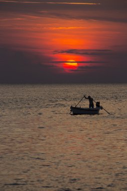 Fishermen at sunset - Rovinj - Croatia clipart