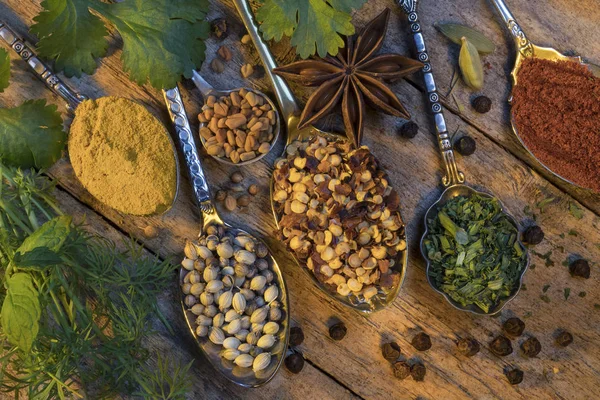 Herbs and spices used to add flavor to cooking — Stock Photo, Image