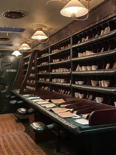 Interior of a vintage British Royal Mail train carriage — 스톡 사진