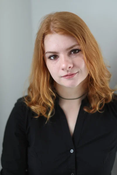 Head Shot of a Red Haired Woman in Black Top — Stock Photo, Image