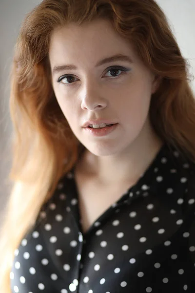 Red Haired Woman in Black Polka Dot Top — Stock Photo, Image