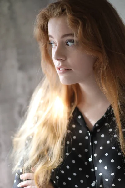 Red Haired Woman in Black Polka Dot Top — Stock Photo, Image