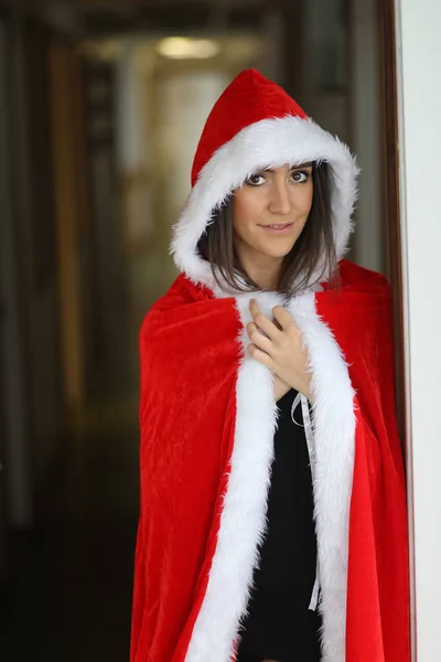 Beautiful Young Woman with Brown Hair and Eyes in Santa Cloak — Stock Photo, Image