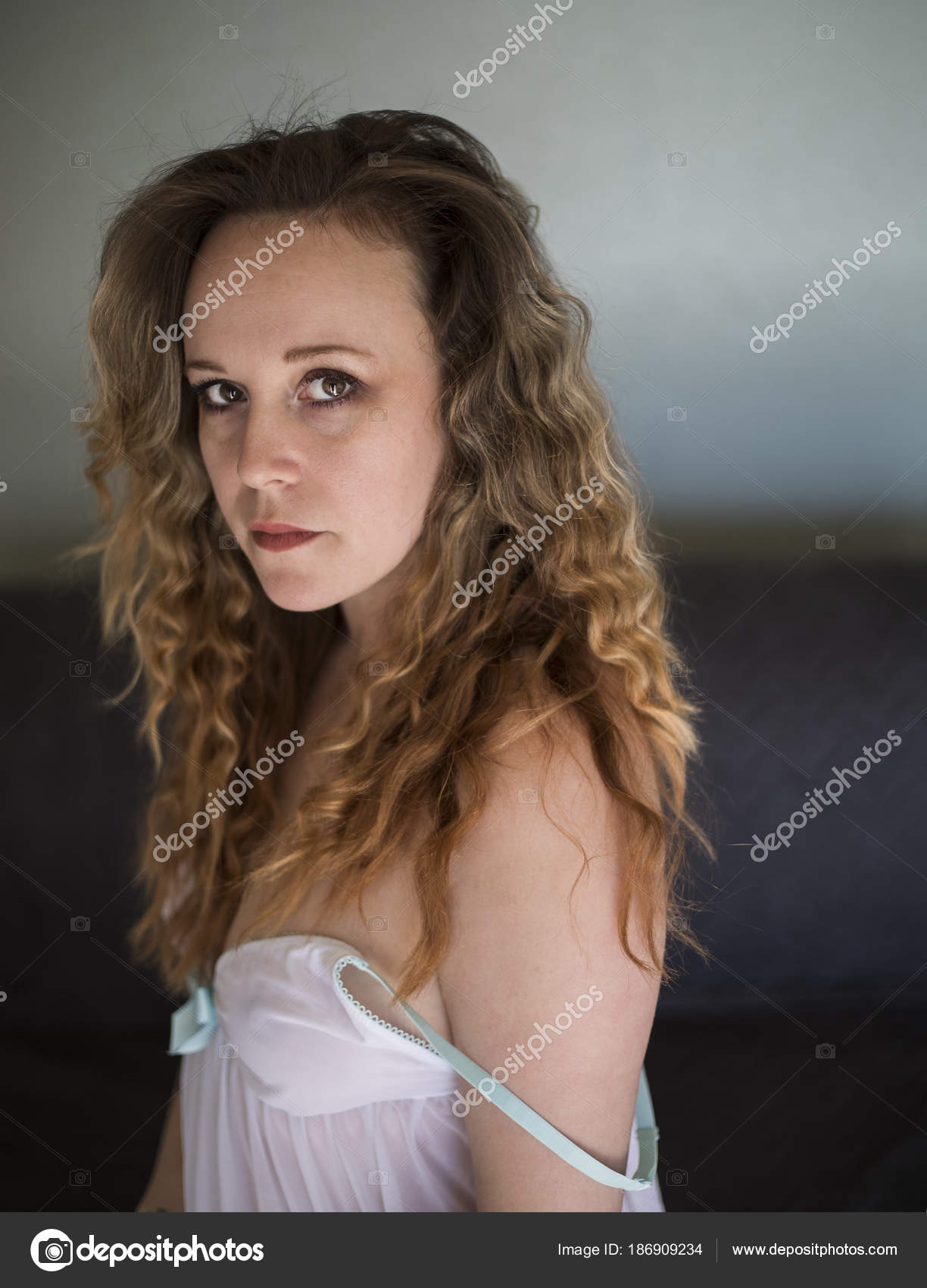 Beautiful Young Woman With Brown Eyes And Blond Hair Stock Photo