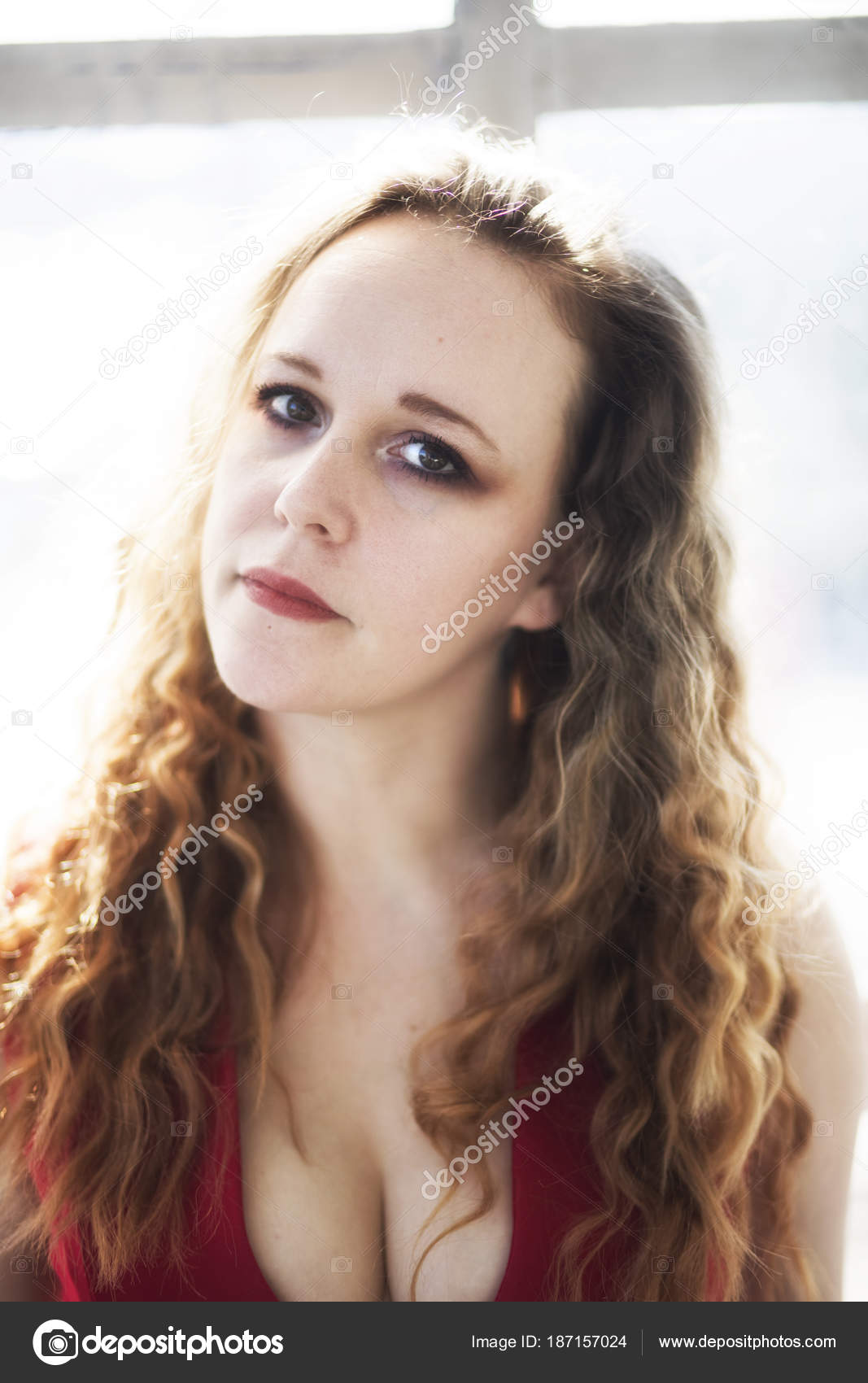 Beautiful Young Woman With Brown Eyes And Blond Hair Stock Photo