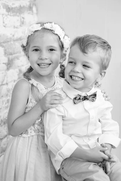 Two charming children stand having joined hands — Stock Photo, Image