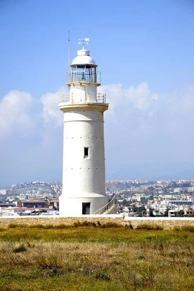 Old lighthouse and cloudy sky from Paphos — Stock Photo, Image