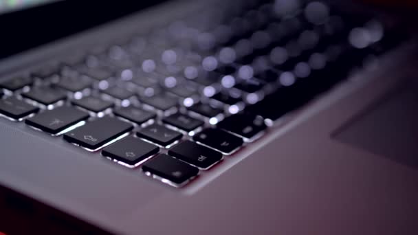 Backlit Laptop Keyboard Dark Room Closeup Coding Screen Man Hands — Stock Video
