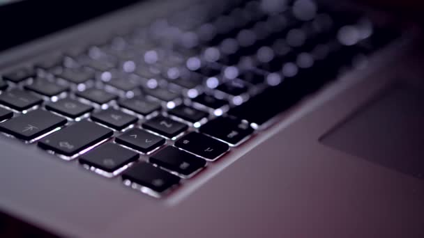 Backlit Laptop Keyboard Dark Room Closeup Coding Screen Man Hands — Stock Video