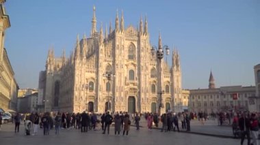 Milan Italy March 6, 2020: people in protective masks. Panic from the Chinese viral corona Covid 19 in Italy. People in the Duomo square and city streets. Quarantine in Milan. Epidemic. Panic MFW.