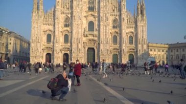 Milan Italy March 3, 2020: people in protective masks. Panic from the Chinese viral corona Covid 19 in Italy. People in the Duomo square and city streets. Quarantine in Milan. Epidemic. Panic MFW. 