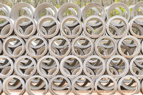 Concrete drainage pipes stacked — Stock Photo, Image