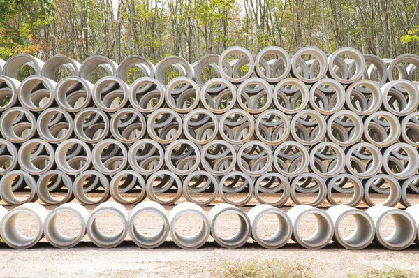 Concrete drainage pipes stacked — Stock Photo, Image