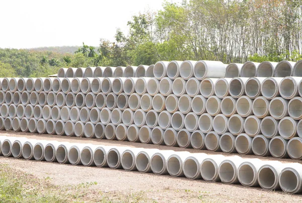 Concrete drainage pipes stacked — Stock Photo, Image