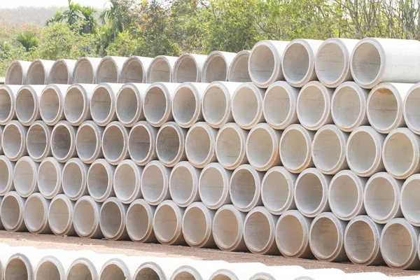 Concrete drainage pipes stacked — Stock Photo, Image