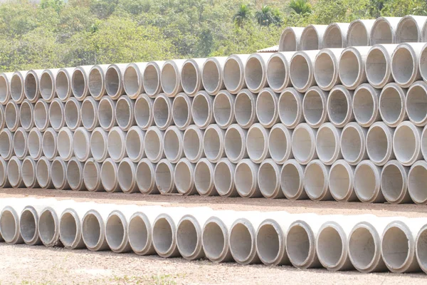 Concrete drainage pipes stacked — Stock Photo, Image