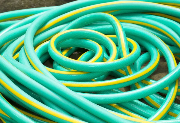 Green water rubber tube — Stock Photo, Image