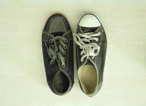 Mismatched Black White Sneakers Old Tiled Floor — Stock Photo, Image