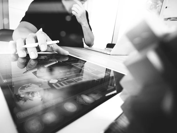 Creative hand working digital tablet and wood puzzle with laptop — Stock Photo, Image