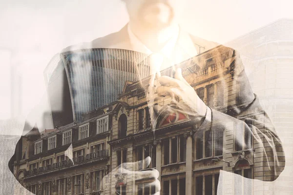 Double exposure of success businessman holding neck tie with Lon — Stock Photo, Image