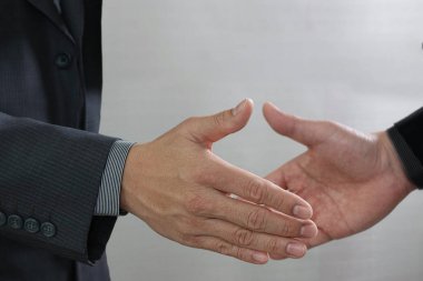 Concept.Photo businessmans handshak toplantı iş ortaklığı
